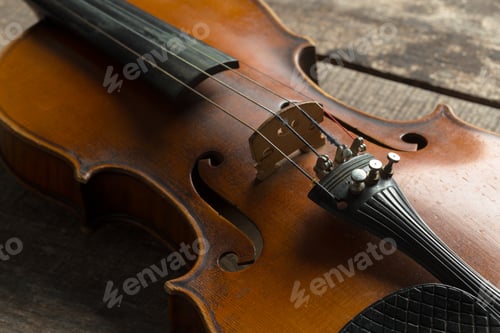 Preview: Violin on a wooden textured table