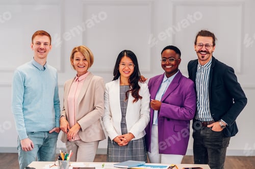 Preview: Multiracial business group of people having a meeting in an office