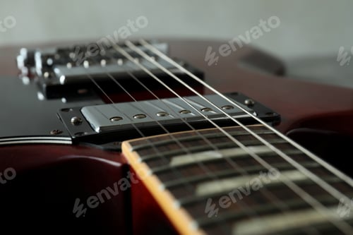 Preview: Red electric guitar, close up and selective focus