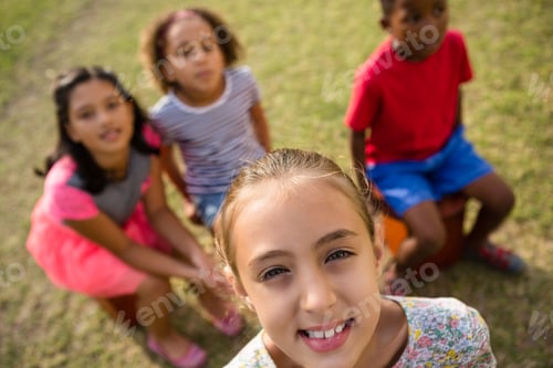 Preview: High angle view of children sitting in yard
