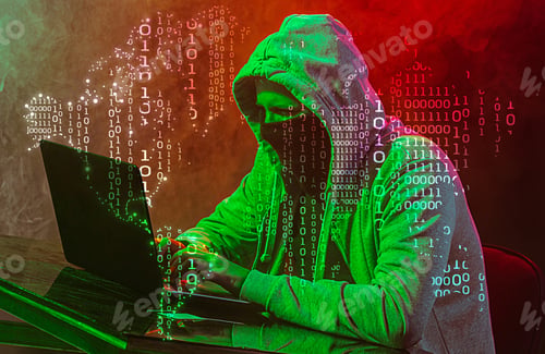 Preview: Hooded Computer Hacker Stealing Information With Laptop