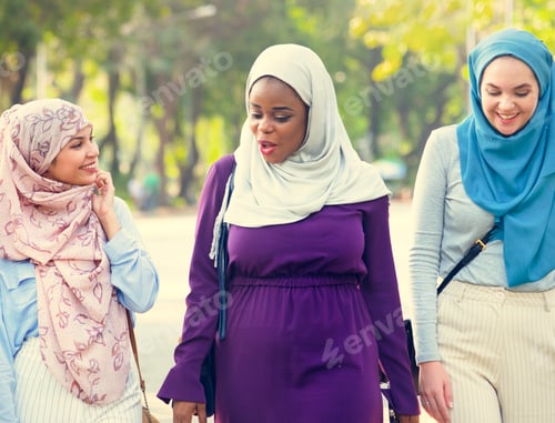 Preview: Islamic women friends walking and discussing together