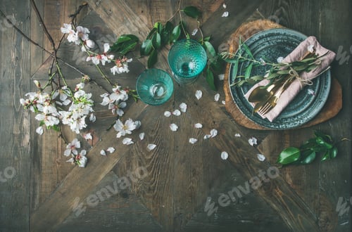 Preview: Flat-lay of Spring Easter Table setting with almond blossom flowers