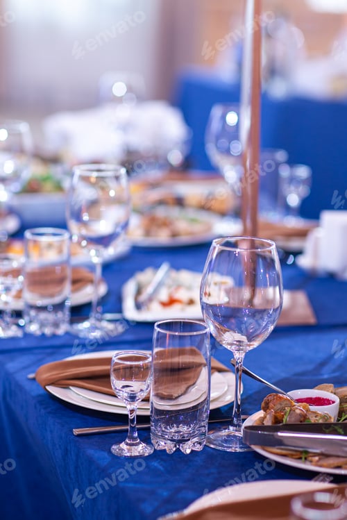Preview: Elegant table setting white plates with napkins on blue tablecloth, tableware served empty table