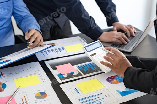 Preview: Meeting Concept Close up hands of a young businesswoman pointing to sale chart in a paper report on