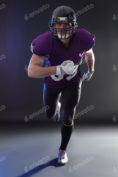 Preview: American football player wearing uniform on dark background
