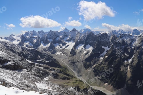 Preview: Les Deux Alpes. Mountain range of the French Alps. Snow-capped peaks. Perennial glaciers.