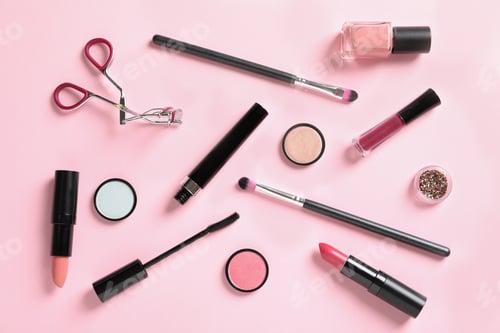 Preview: Flat lay composition with products for decorative makeup on pastel pink background