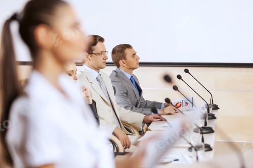 Preview: Businesswoman Standing On Stage And Reporting For Audience