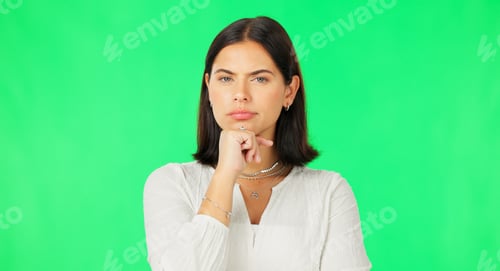 Preview: Face, idea and decision with a woman on a green screen background in studio to consider an option.