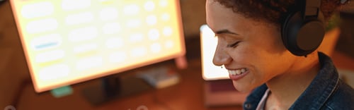 Preview: Woman graphic designer is using smartphone during work day in home office