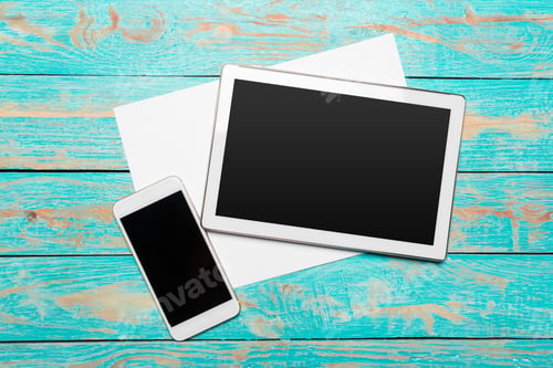 Preview: White digital tablet on wooden table