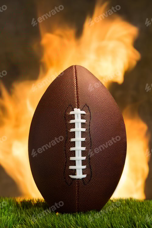 Preview: American football ball with fire at the background