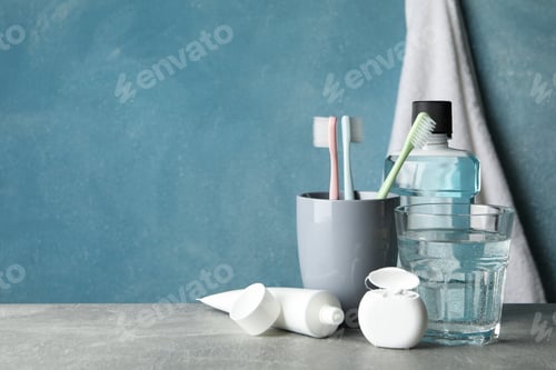 Preview: Tools for dental care on blue background, space for text