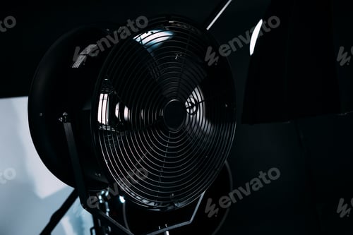 Preview: Modern photo studio with professional equipment. Black cyclorama.