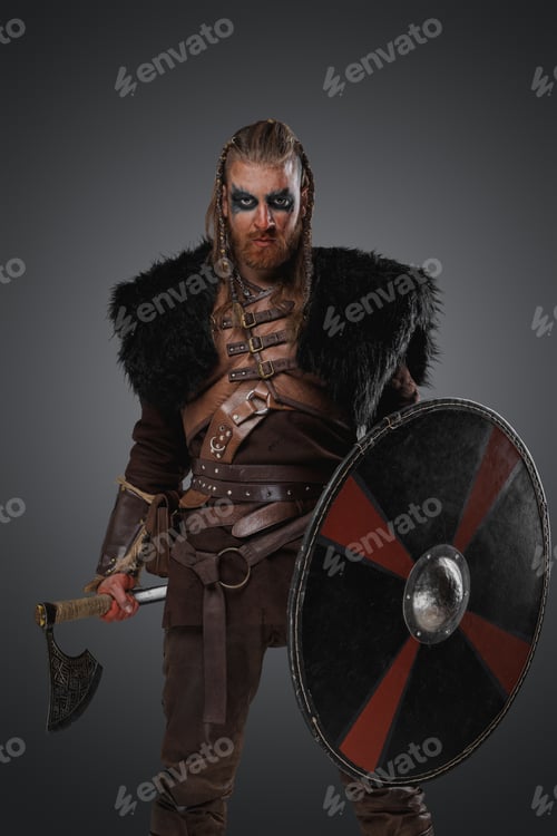 Preview: Bearded scandinavian barbarian with shield and axe from past