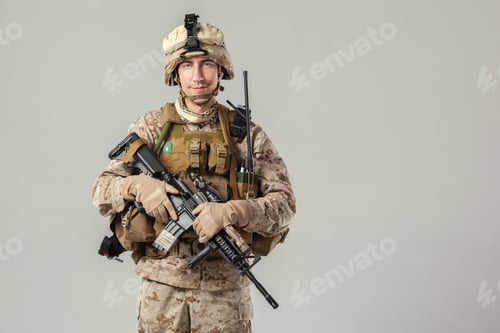 Preview: Soldier stands with firearm in military uniform indoors during practice session