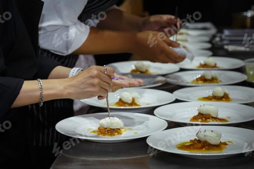 Preview: chef cooking add sauce to dessert dish. decorating delicious meal in restaurant kitchen for dinner.