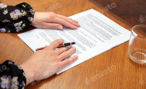 Preview: Contract sign. Woman read the agreement. Lawyer, notary office. Female hand hold a pen, close up
