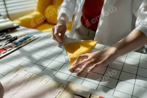 Preview: a designer is adjusting fabric to look stylish with her skill, a designer use her creativity to craf