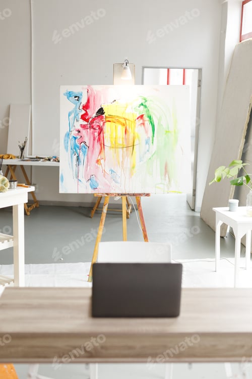 Preview: Modern abstract oil painting on canvas sitting on easel in artists studio