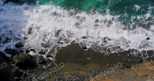 Preview: Black sand volcanic rocky beach with huge waves at Tenerife. Cinematic seascape. Beautiful wild