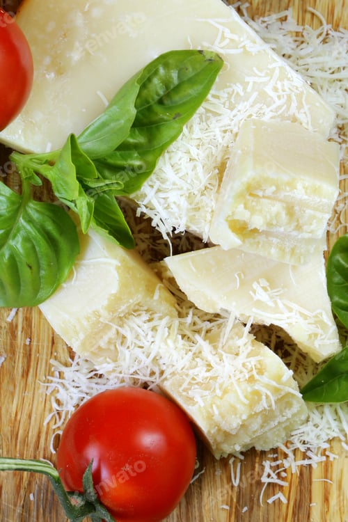 Preview: parmesan cheese with fresh basil on wooden background