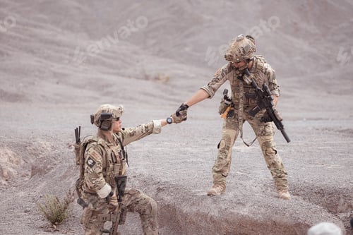 Preview: Soldiers in camouflage military uniforms carrying weapons Reconnaissance missions in rugged mountain