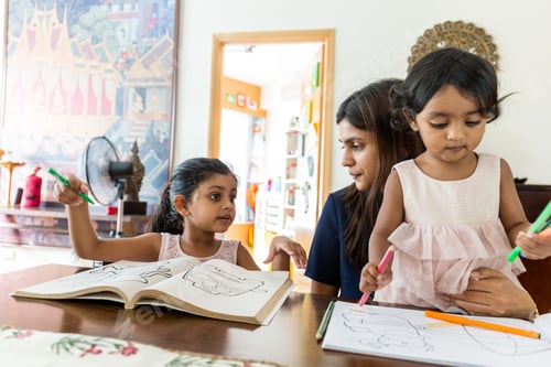 Preview: Indian Family Do Drawing On Book