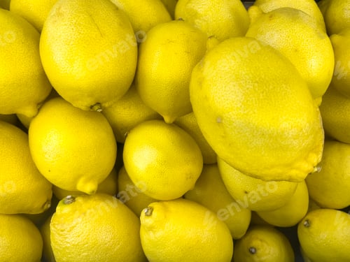 Preview: tangerines lemons citrus fruits in a grocery store or market top view close up