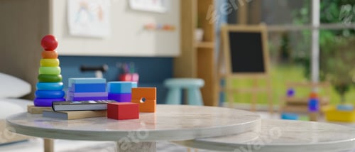 Preview: Kid toys on tabletop over blurred background of colorful kindergarten classroom or kids playroom