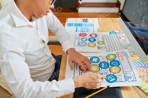 Preview: UX Designer Rearranging Icons