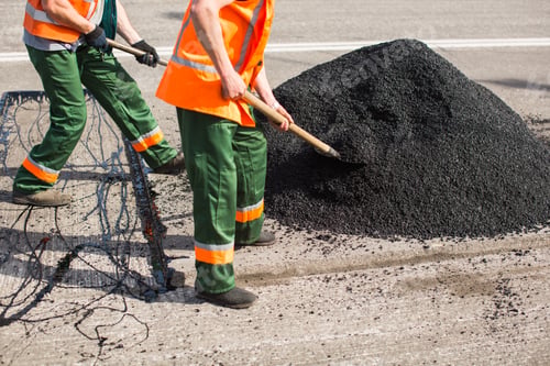 Preview: Repair of roads, highways and sidewalks. Patching. Working with a shovel falls asleep in the pit.