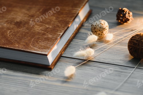 Preview: Luxury wooden photo book on natural background. Family memories photobook