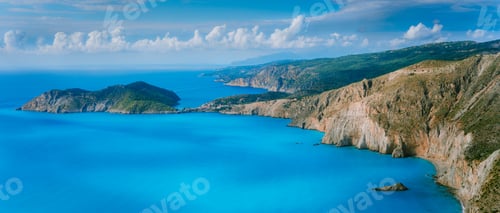 Preview: Stunning coastal panorama and beautiful clouds at the horizon on Kefalonia island. Mediterranean Sea
