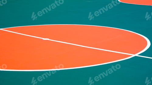 Preview: Outdoor futsal court background with orange circle center and white line on green concrete ground