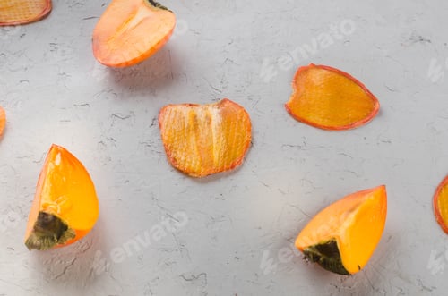 Preview: persimmon with dried pineapple wedges