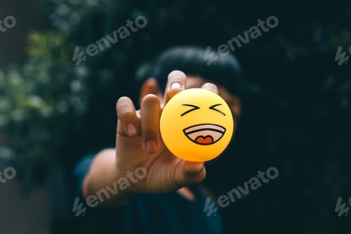 Preview: Laugh emoticon held by kid