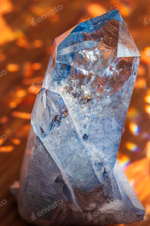 Preview: blue quartz crystal geologic formation refracting in natural sunlight