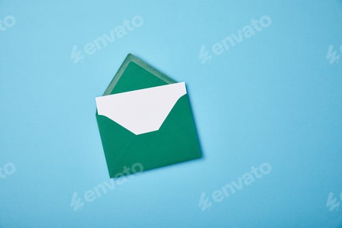 Preview: green envelope with blank white card on blue background