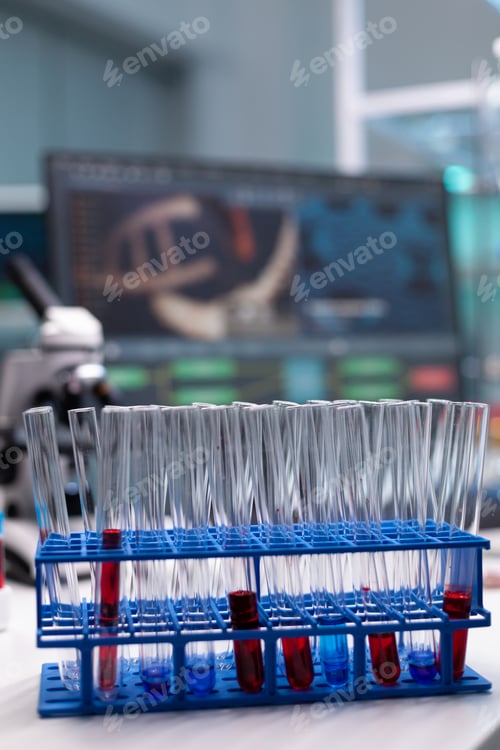 Preview: Close up of tube rack with test tubes on laboratory desk
