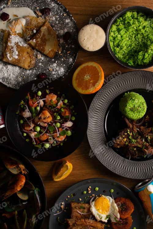 Preview: Table full of plates with food. Table to go eat. Aerial view of a served table
