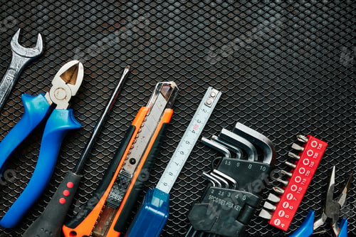 Preview: Hardware tools wrench screwdriver tape hammer on steel surface. Tools for maintenance and fix