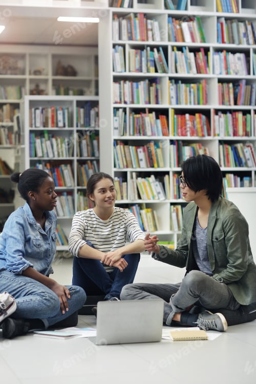 Preview: Students studying in the library