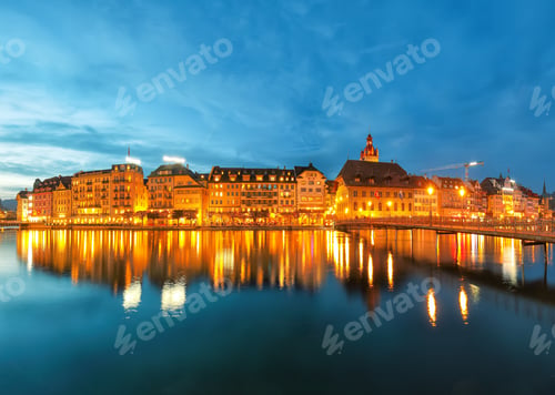 Preview: Beautiful historic city center of Lucerne with famous buildings during night..