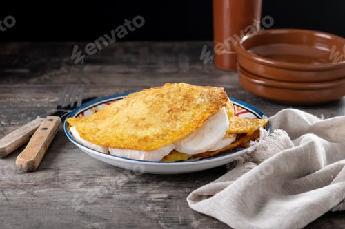Preview: Traditional Venezuelan beef cachapa on wooden table