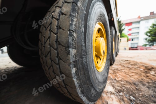 Preview: Big wheels of a lorry on a construction site