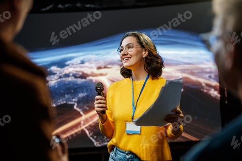 Preview: woman is giving a presentation at conference