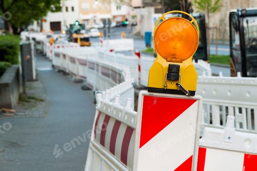 Preview: Orange construction Street barrier light on barricade. Road construction on the streets