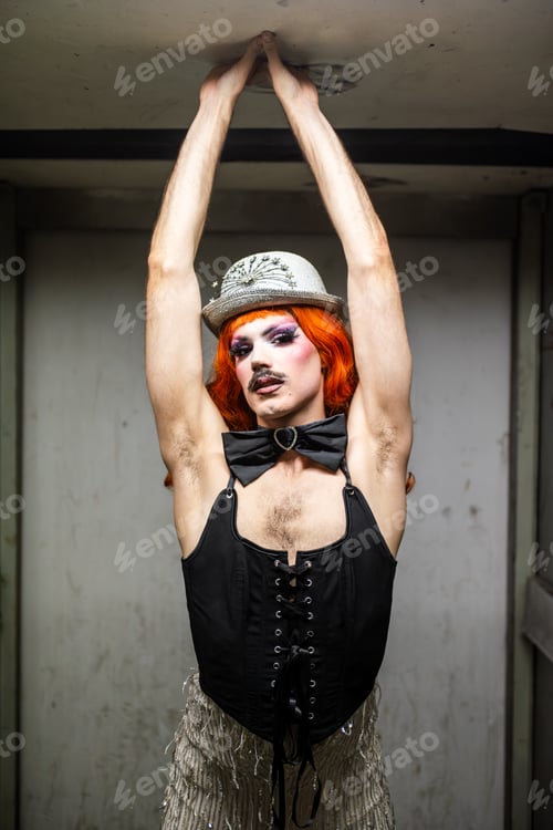 Preview: Queer Cabaret Performer Stretches in a Vintage Outfit Under Bright Lights Backstage
